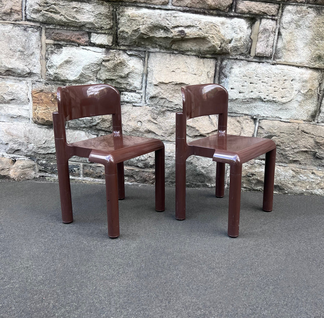 Brown plastic chairs by Eero Aarnio for UPO